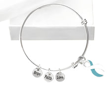 Load image into Gallery viewer, Large Teal &amp; White Ribbon Awareness Retractable Bracelets - Fundraising For A Cause