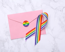 Load image into Gallery viewer, Roll He Him Pronoun Rainbow Flag Stickers - The Awareness Company